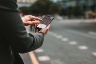 person using taxi app alternative for uber in albania