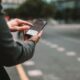 person using taxi app alternative for uber in albania